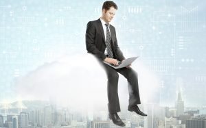 a man sitting on a cloud for eStorm Australia's virtual CIO blog